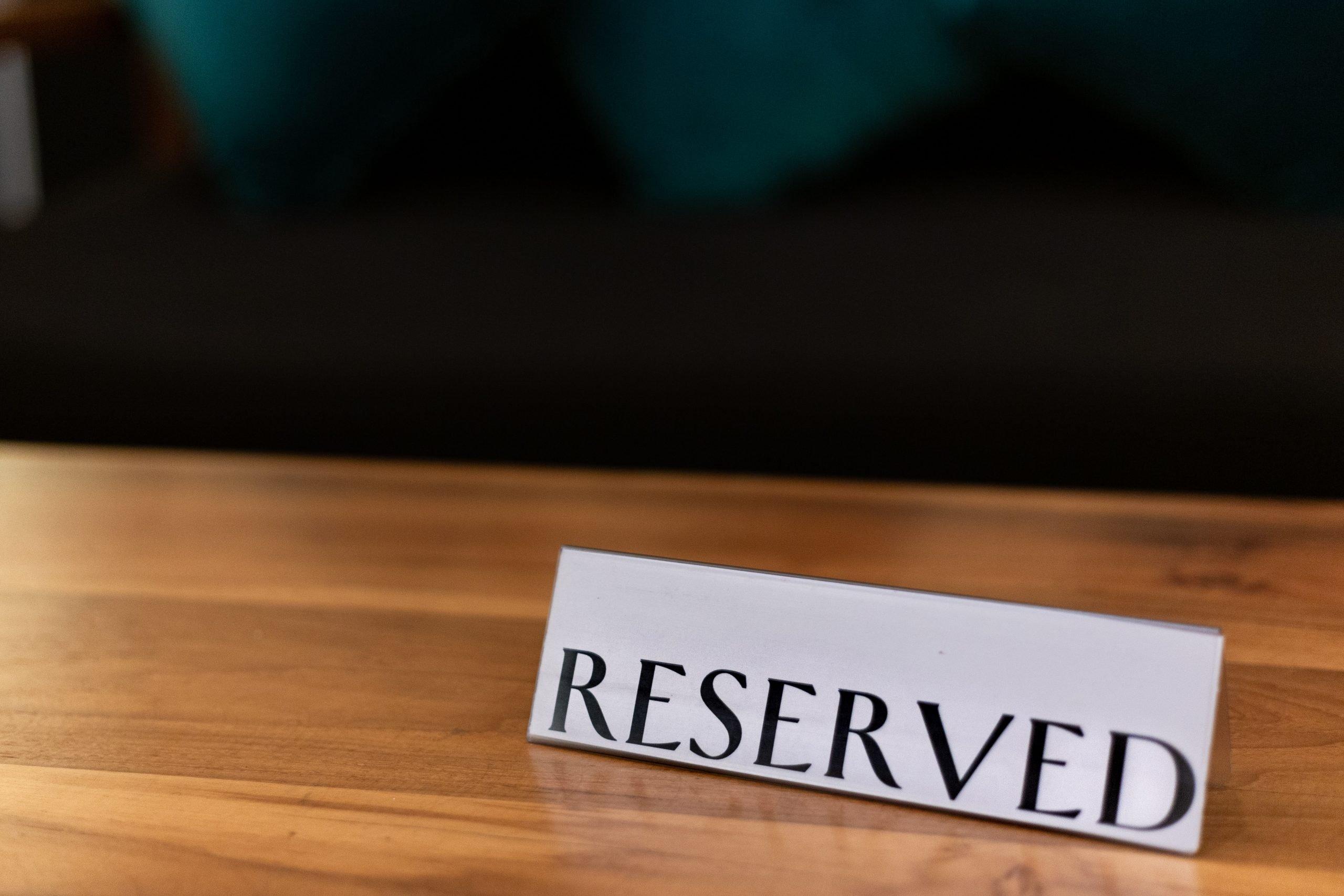 "reserved" placard for a VIP
