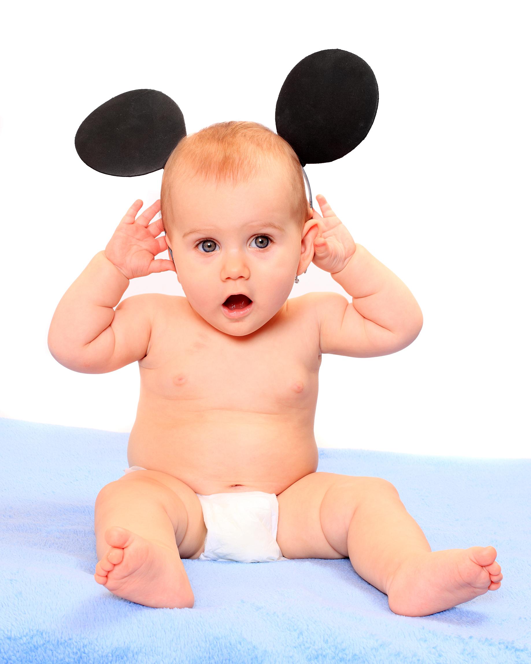 Best Gift Shops at Disney World for Purchasing Souvenirs with Your Family - Mickey Ears on a Baby