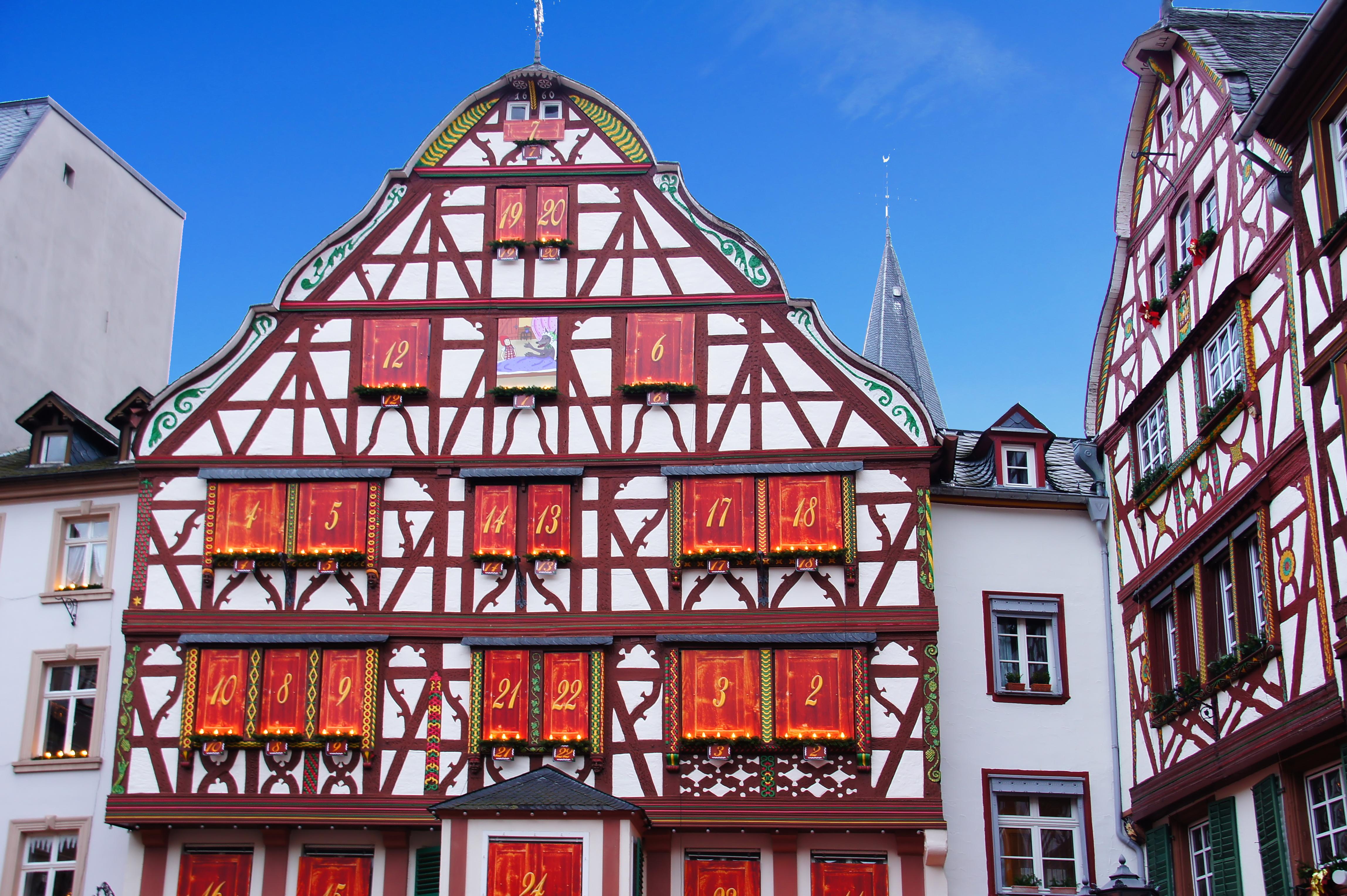 Amazing Christmas Traditions Around the World to Experience During Your Family Vacation - Advent Calendar Facade in Bernkastel-Kues Germany