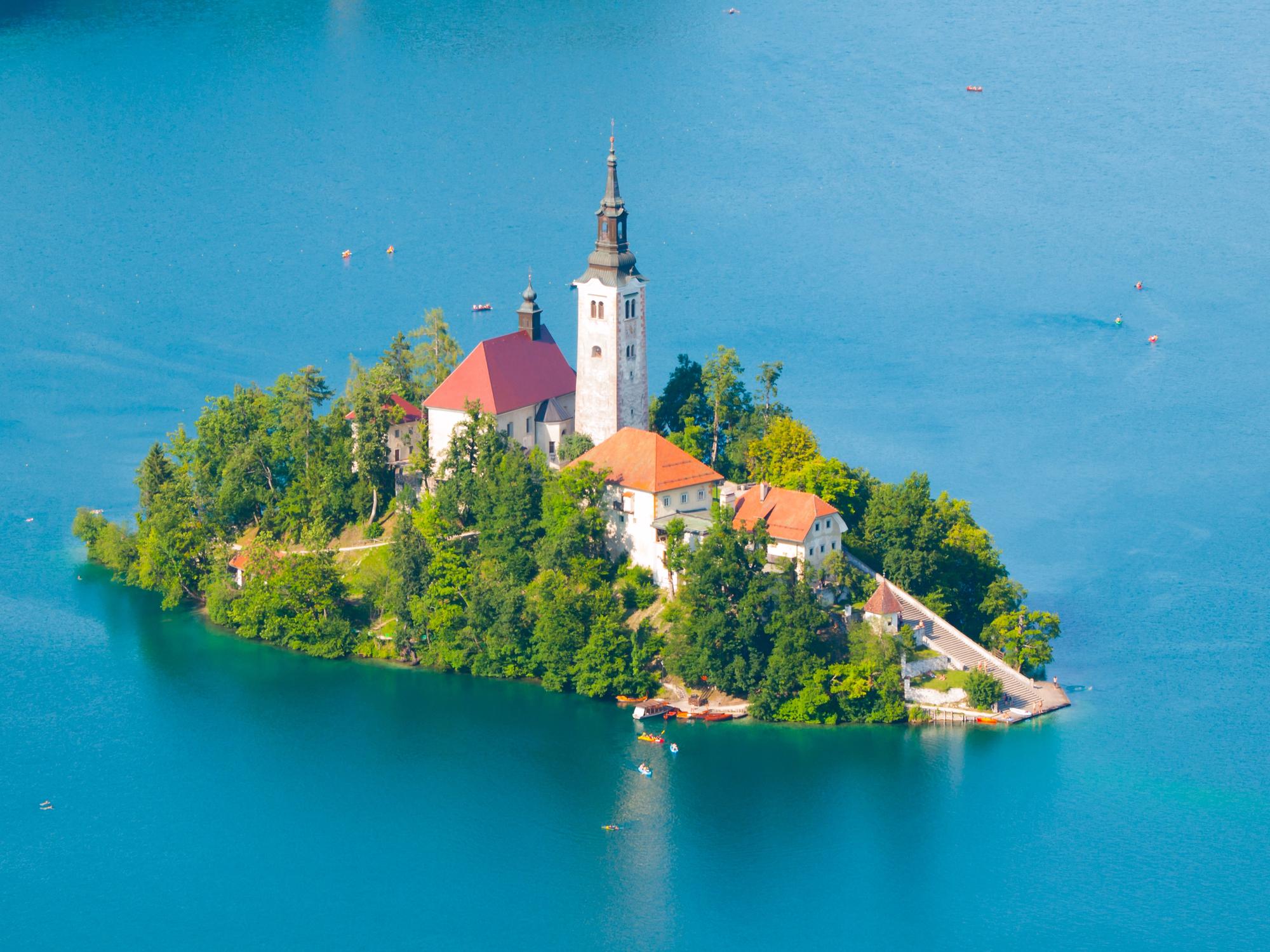 Best Places to Disconnect and Unwind as a Solo Female Traveler - Lake Bled Island with Church in Slovenia