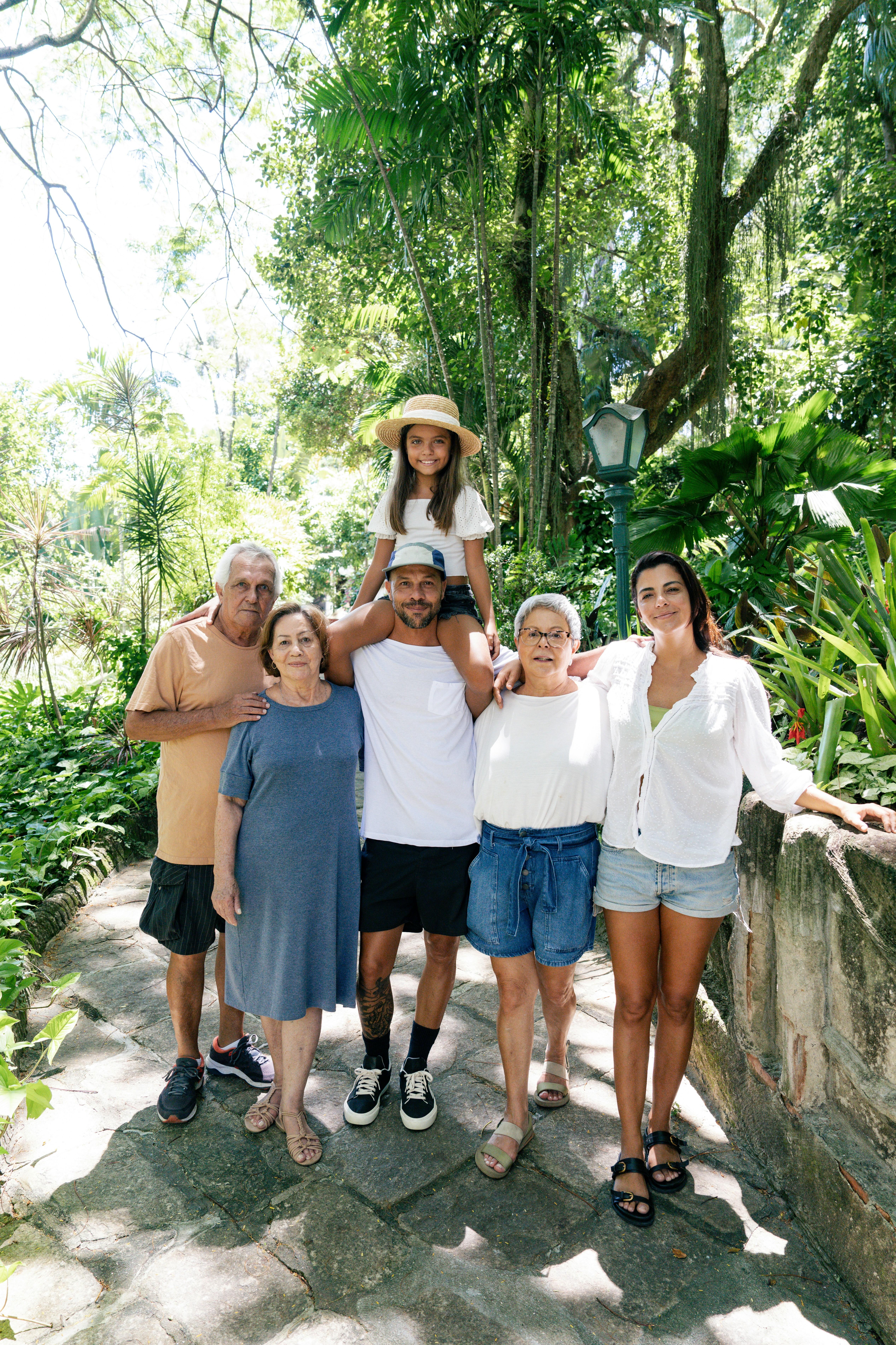 Family Adventures: Don't Wait to Create Timeless Memories Across Generations - Multigenerational Family near palm trees