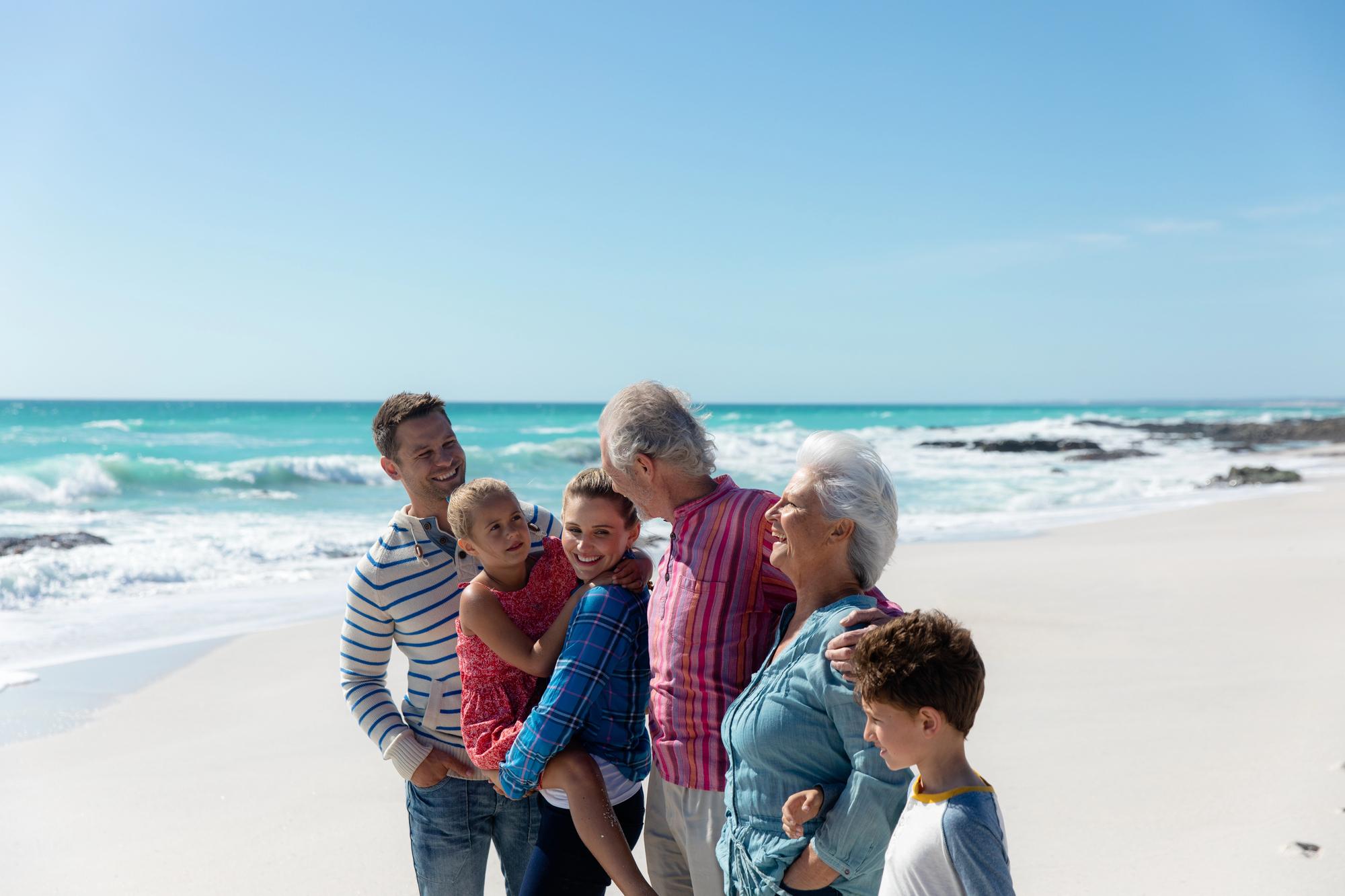 Multigenerational Family on the Beach While on Vacation